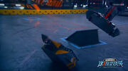 Tánshè is thrown over by the floor flipper