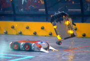 Sandstorm is thrown up by Xiake, losing a wheel