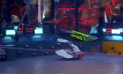 Tánshè throws ORBY Blade out of the arena