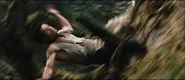 The man tumbling to his death from the log, to his death below.