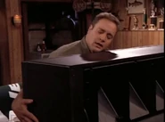 Doug hugging the T.V.