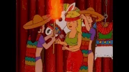 Blindfolded Luanne is playing the piñata with flaming pole.
