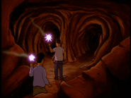 Kahn and Hank journeying through The Caves