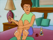 Peggy coloring her Toenails