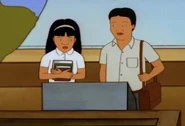 Young Minh and Kahn at an exhibit