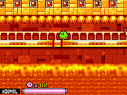 Kirby explores a fiery building, located on the volcano.