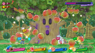 Kirby and his Friends battle Whispy Woods.