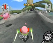 Kirby about to enter the tunnel near some Pichikuris.