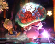 Kirby siendo atacado por un Metroid.