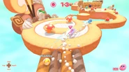 Racing across a smaller cake platform.