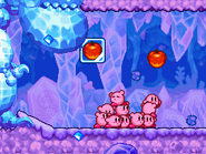 The Kirbys run from Freezy Rex inside a frozen cave.