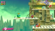 Kirby climbs upward, preparing for the boss fight.