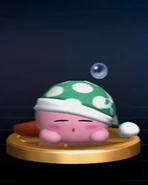 Trofeo de Kirby Sueño en Super Smash Bros. Brawl.