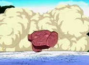 Stone Kirby runs wild in Cappy Town after destroying a house.