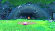 Kirby guards before the tunnel's mouth.