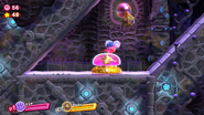 Kirby prepares to press the big switch of the stage.