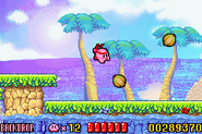 Kirby: Nightmare in Dream Land (Kirby air throwing an explosive coconut)