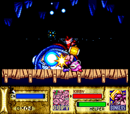 Copy Kirby battles Fatty Whale. (Kirby Super Star)