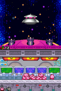 A UFO attacks the Kirbys' spaceship.