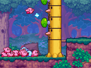 A Kirby bounces off a mushroom.