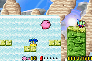 Kirby in front of a large waterfall. (remake)