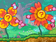 Unos Kirbys atacando unas flores.