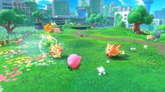 Kirby inhales one of the fox enemies. Sir Kibble can be seen in the distance.