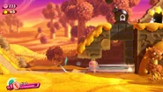 Stab-Kirby6.png (2,28 MB) Stab-Kirby führt Super-Langschoß vor, um einen Bombenblock sicher zu erreichen.