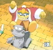 Dedede tries to break Escar-droid.