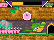 Varios Kirbys atacando a un gran enemigo.