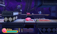 Kirby crouches inside a haunted mansion.