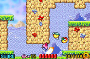 Kirby fighting two Blippers in the water (remake).