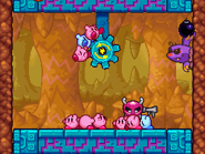 A purple Mole prepares to throw a bomb.