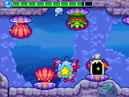 Shellmic grins after hurting a Kirby.