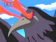 Crowmon attacks with a piercing red eye-beam.