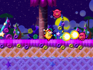 Beam Kirby defeats a Flotzo using Wave Beam.