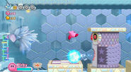 A giant Strike Box shoots at Kirby.