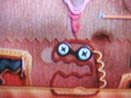 A Magmotamus after being pounded by Kirby's Weight form.