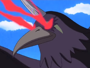 Crowmon attacks with a piercing red eye-beam.