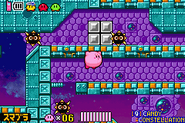 Kirby making his way through a Gordo-infested tunnel.