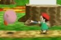 Adeleine attacks Kirby.