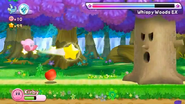 Kirby battling Whispy Woods EX.