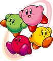 Розовый, жёлтый, красный и зелёный Кирби из Kirby & The Amazing Mirror