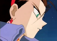 A side view image, showing a serious Miss Kazue