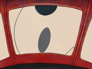 A Giant Numbuh 3's monster eye staring intently into the now shrunken I.T.S.I.B.I.T.S.Y.