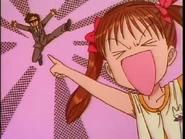 Sana pointing at Rei