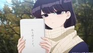 Shouko answers using her notebook.