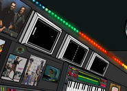 The three ceiling monitors in 2D's room