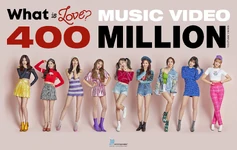 400 млн просмотров "What is Love?"