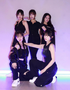A photo of 5 of the members, posted as an official Instagram story